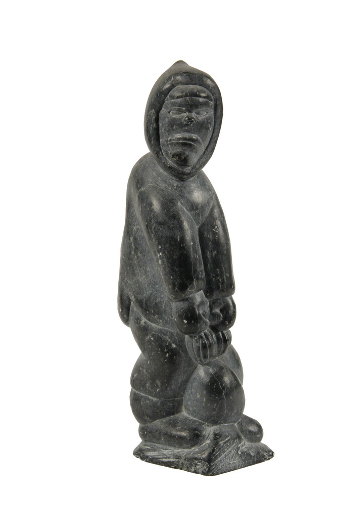 Appraisal: INUIT ESKIMO SCULPTURE - Greystone Figure of a Standing Hunter