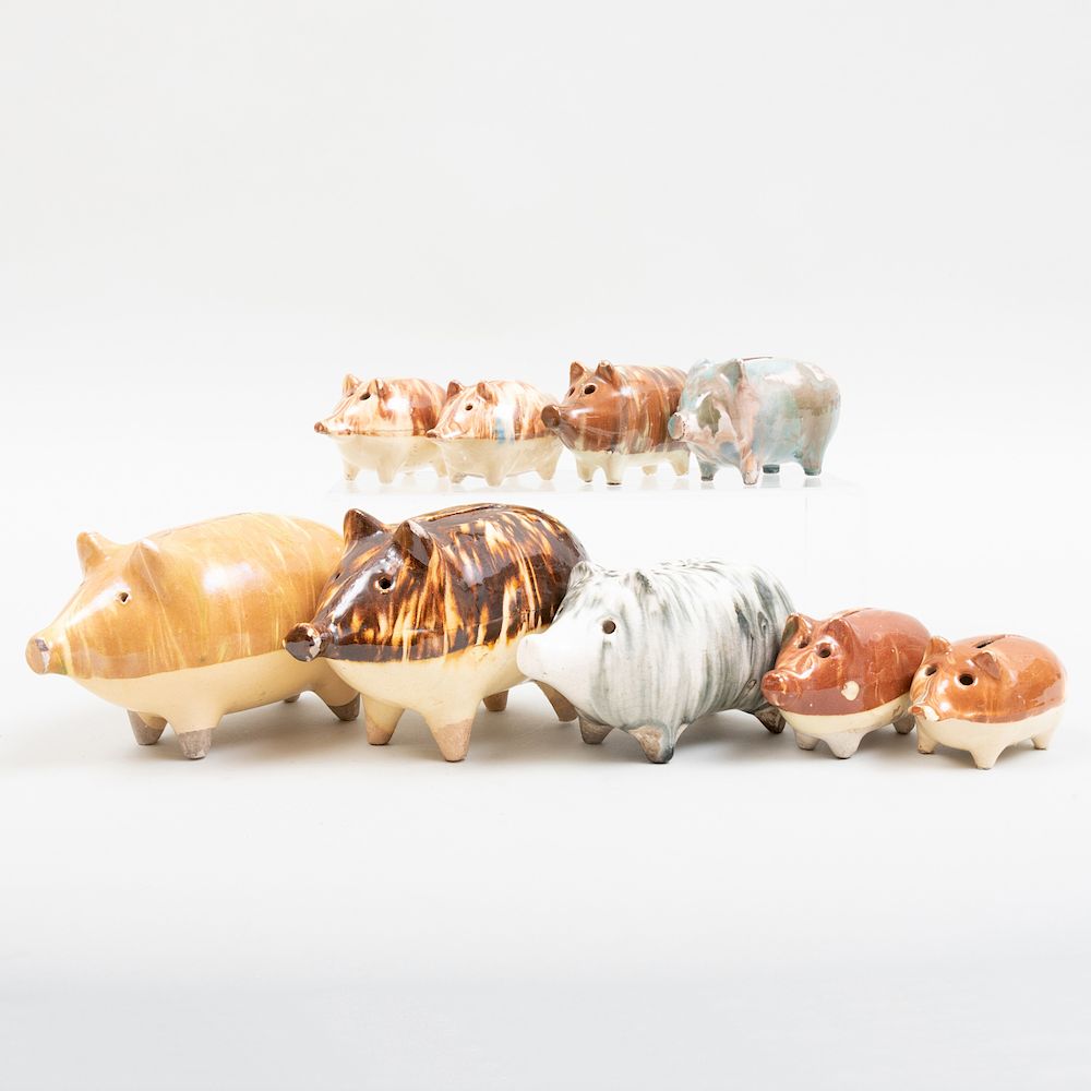 Appraisal: Group of Nine Glazed Pottery Piggy Banks The largest in