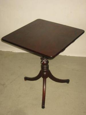 Appraisal: A GEORGE III MAHOGANY TRIPOD TABLE the rounded oblong tip