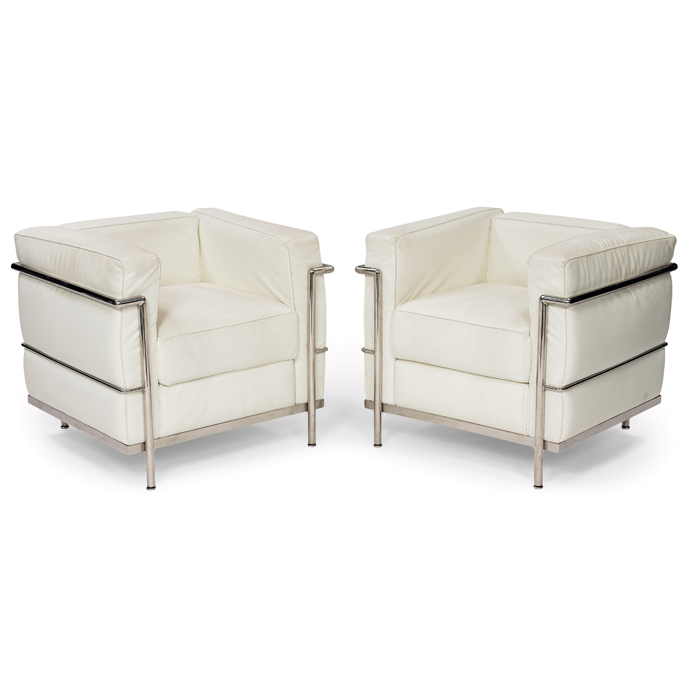 Appraisal: Le Corbusier LC chairs pair maker unknown white leather cushions