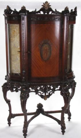 Appraisal: Ornately carved Louis VX style wine cupboard one piece construction