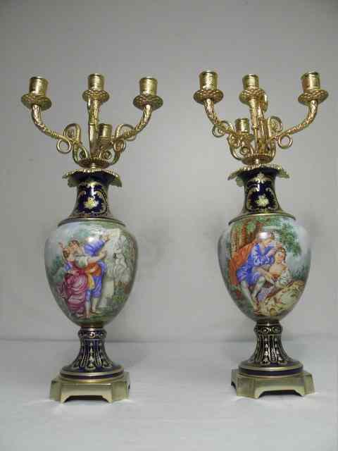 Appraisal: Pair th century Sevres porcelain and gilt bronze candelabra with