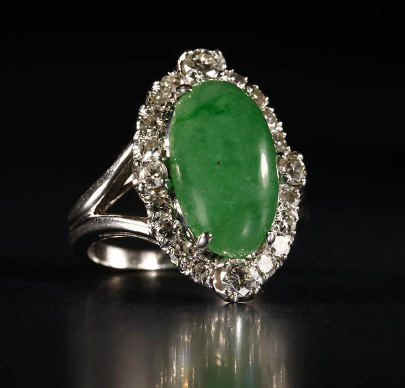 Appraisal: A platinum jadeite and diamond ring A platinum jadeite and