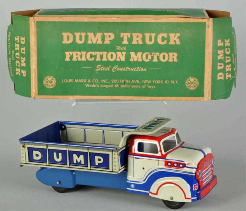 Appraisal: Tin Marx Lumar Friction-Motored Dump Truck Toy Description American Working