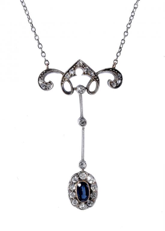 Appraisal: AN ART NOUVEAU SAPPHIRE AND DIAMOND PENDANT the knife wire