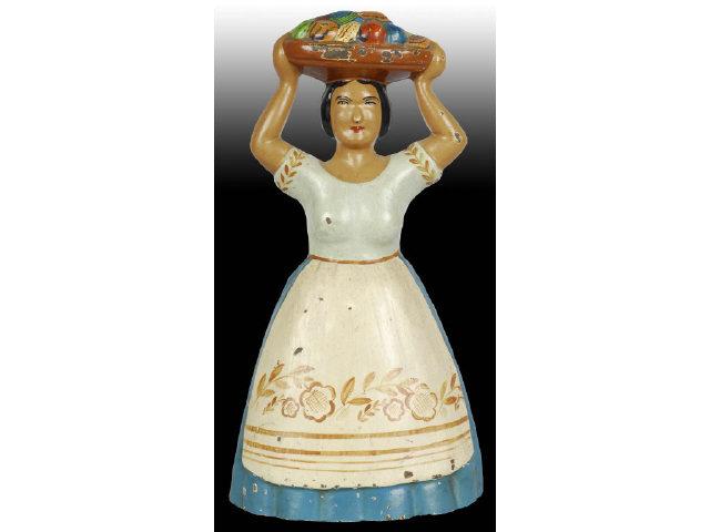 Appraisal: Tropical Woman with Fruit Cast Iron Doorstop Description Numbered on