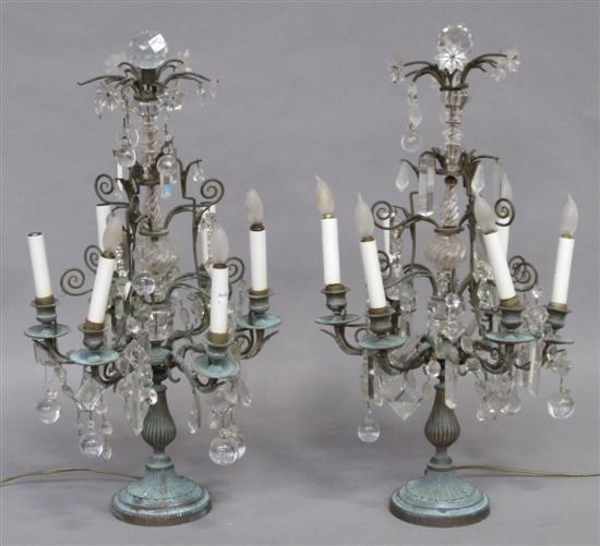 Appraisal: PAIR TIERED CANDELABRA LAMPS Crystal and verdigris bronze with six