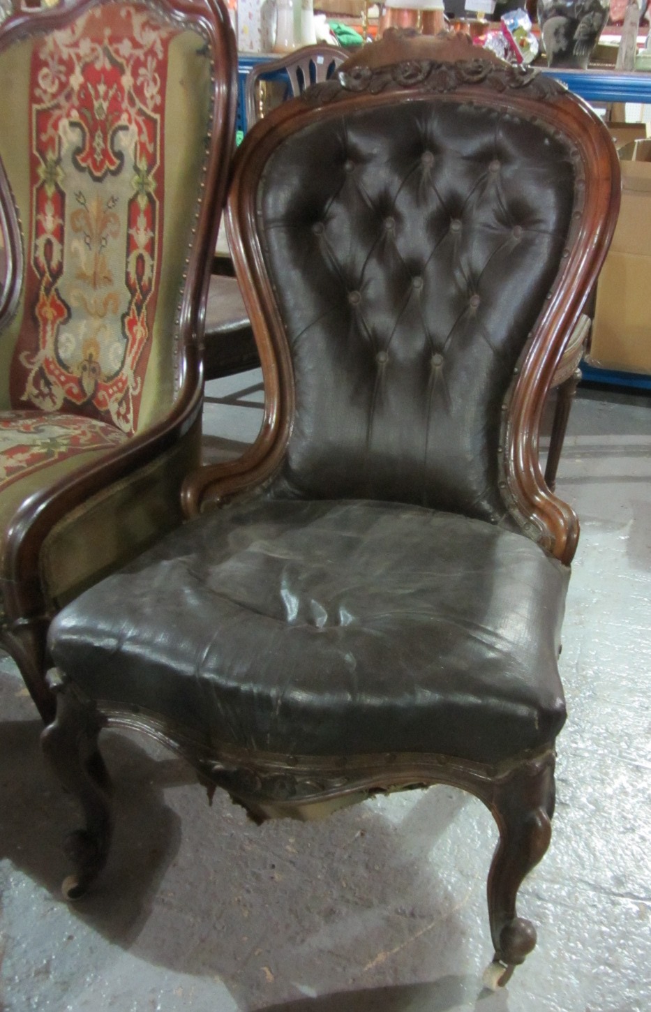 Appraisal: A Victorian mahogany framed nursing chair on cabriole supports