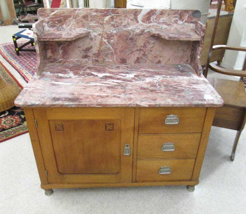 Appraisal: MARBLE-TOP OAK WASHSTAND Belgian early th century having a rectangular