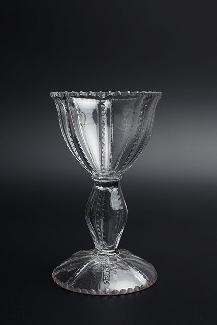 Appraisal: AN TH CENTURY GLASS SWEETMEAT DISH with facet cut bowl