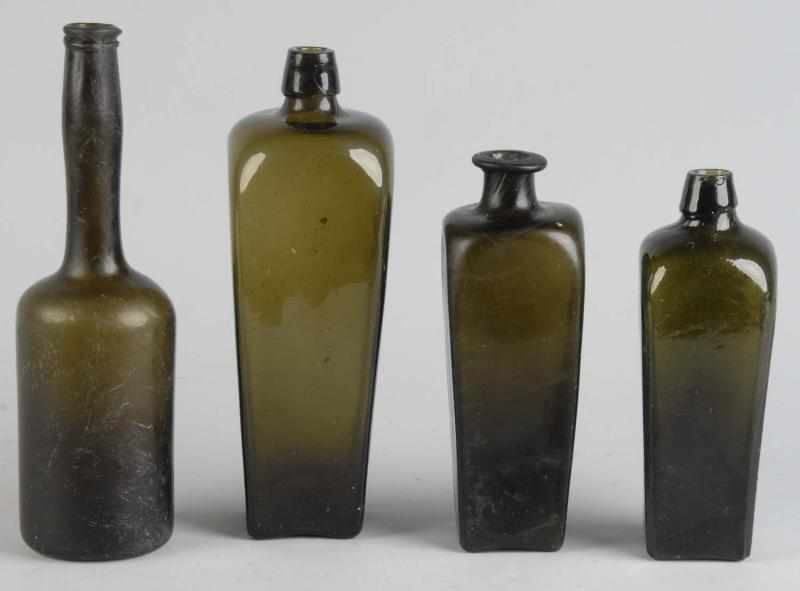 Appraisal: Lot of Early Green Glass Bottles Description Unmarked One with