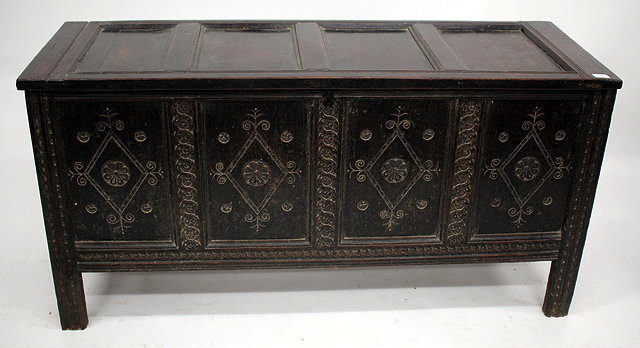 Appraisal: AN TH CENTURY OAK COFFER with quadruple panelled lid the