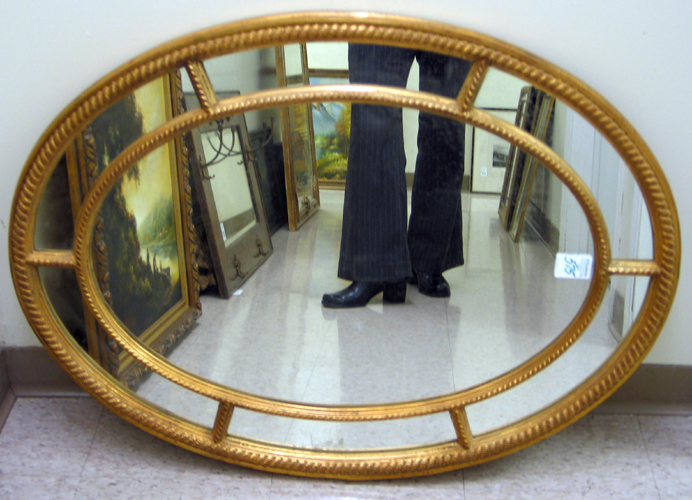 Appraisal: AN OVAL ROPE MOTIF DECORATOR'S WALL MIRROR having an antique