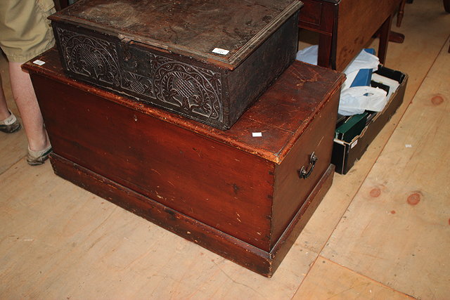 Appraisal: A VICTORIAN DARK STAINED PINE BLANKET BOX with iron carrying