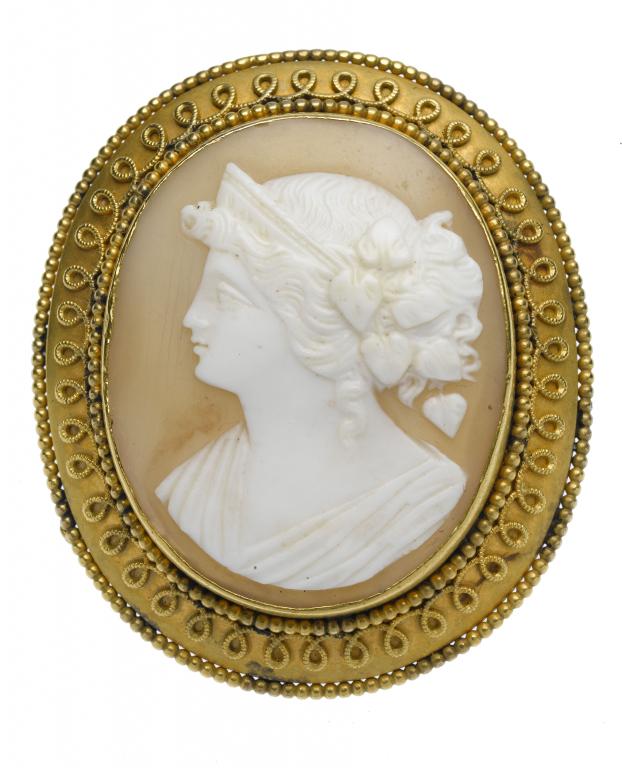 Appraisal: A VICTORIAN CAMEO BROOCH the oval shell carved with the