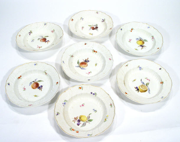 Appraisal: Seven Meissen porcelain bowls moulded with latticework rims hand painted