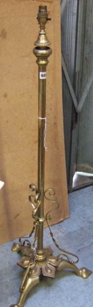 Appraisal: An early th century brass standard lamp with turned column