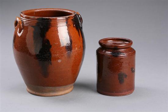 Appraisal: TWO REDWARE JARS American nd half- th century Pictured is