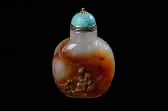 Appraisal: CHINESE AGATE SNUFF BOTTLE Carved with scholar monkey and pine