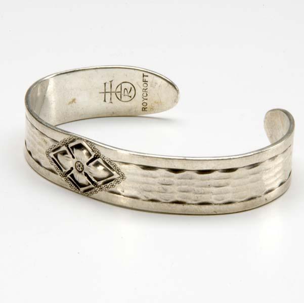 Appraisal: ROYCROFT Hammered silver cuff bracelet with quatrefoil design Stamped ROYCROFT