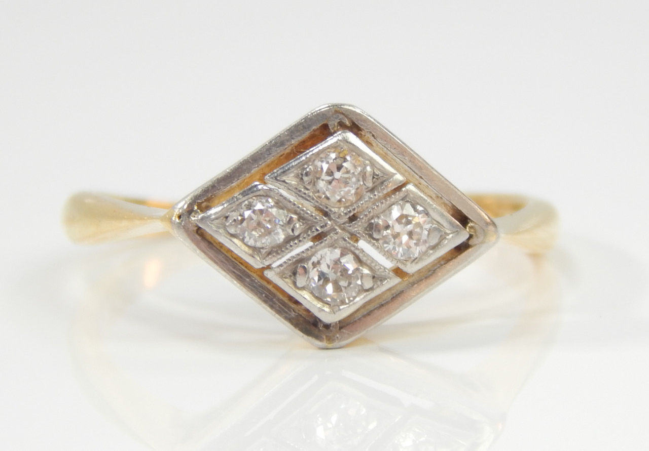 Appraisal: An Art Deco style ring having four illusion set diamonds