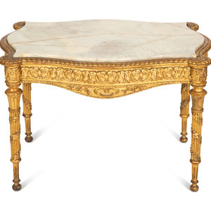 Appraisal: An Italian Giltwood Onyx-Top Low Table Circa Height x length