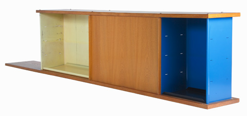 Appraisal: JEAN PROUVE Wall-hanging cabinet with single sliding door and enameled