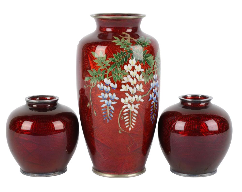 Appraisal: THREE PIGEON'S BLOOD GINBARI CLOISONNE VASEScomprising one decorated with flowers