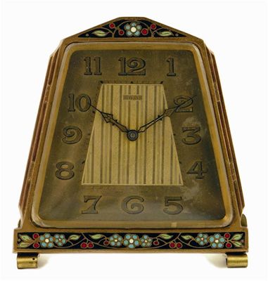 Appraisal: A brass and enamel art deco style desk clock the