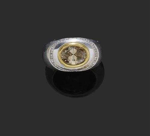 Appraisal: DIAMOND RING P CLARD White and yellow gold Casual-elegant band