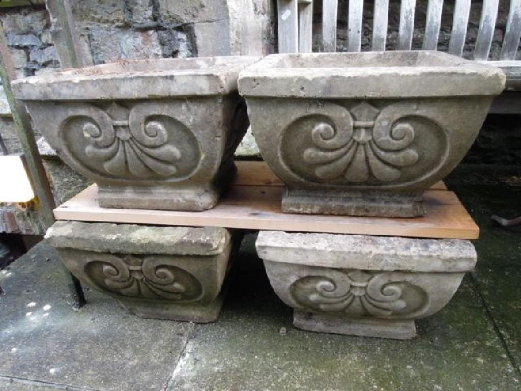 Appraisal: Two pairs of cast composition stone planters of square cut