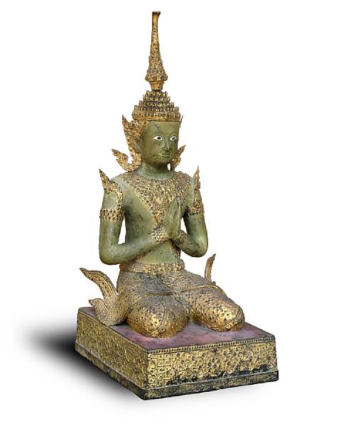 Appraisal: A Thai green and gilt lacquered bronze kneeling Buddha th