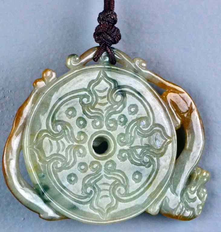 Appraisal: Chinese Qing Carved Jade PendantCarved to depict bats dragon and