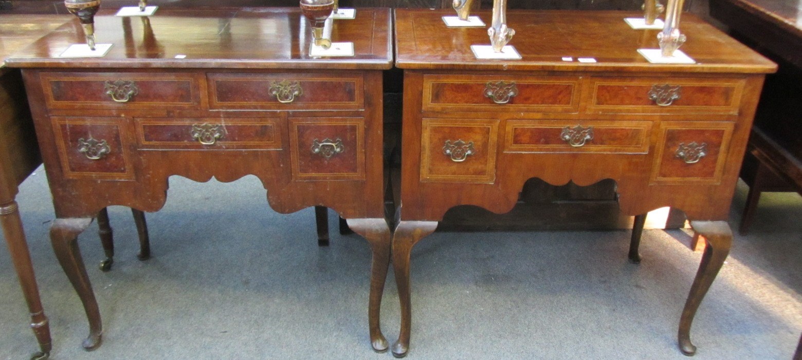 Appraisal: A pair of th century style inlaid walnut lowboys each