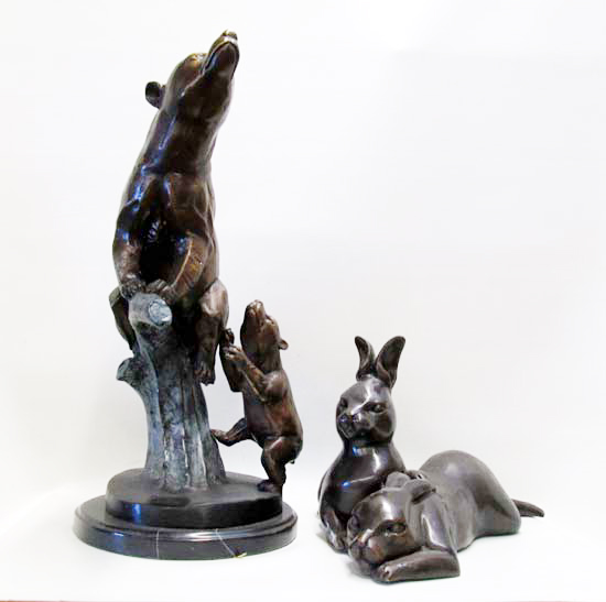 Appraisal: TWO PATINATED BRONZE ANIMAL SCULPTURES a mother bear on a