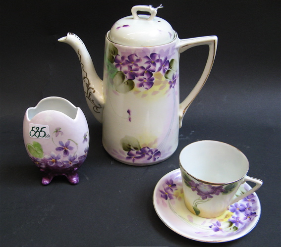 Appraisal: THIRTEEN PIECE PORCELAIN COFFEE SET A VASE the set by