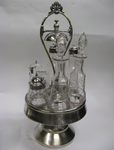 Appraisal: AMERICAN SILVER PLATED VICTORIAN CASTOR SET having molded glass bottles