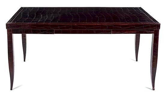 Appraisal: An Art Deco Style Embossed Leather-Veneered Writing Table Height x