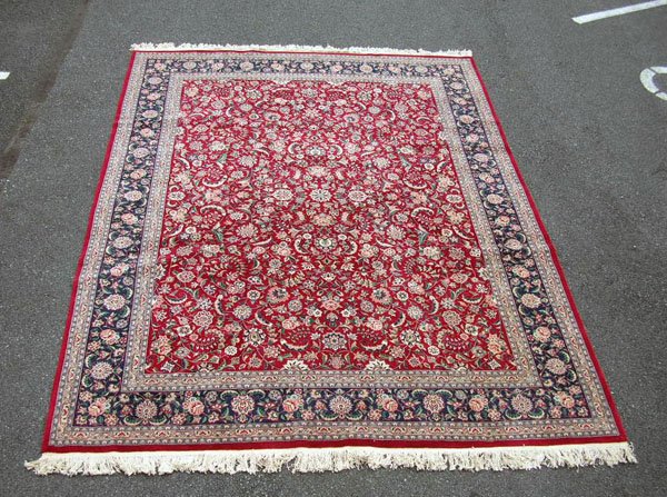 Appraisal: Modern room size Oriental rug red field no label MEASUREMENTS