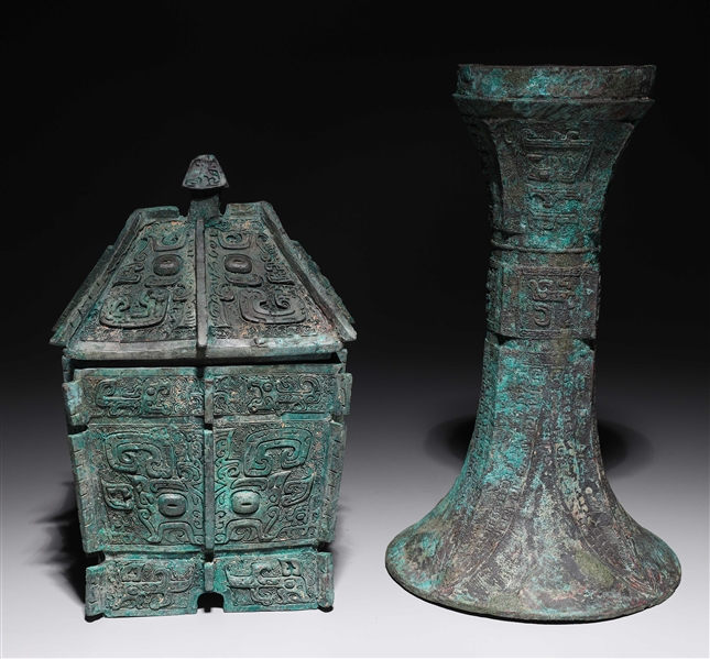 Appraisal: Two Chinese arachaistic bronzes including covered vessel and gu form