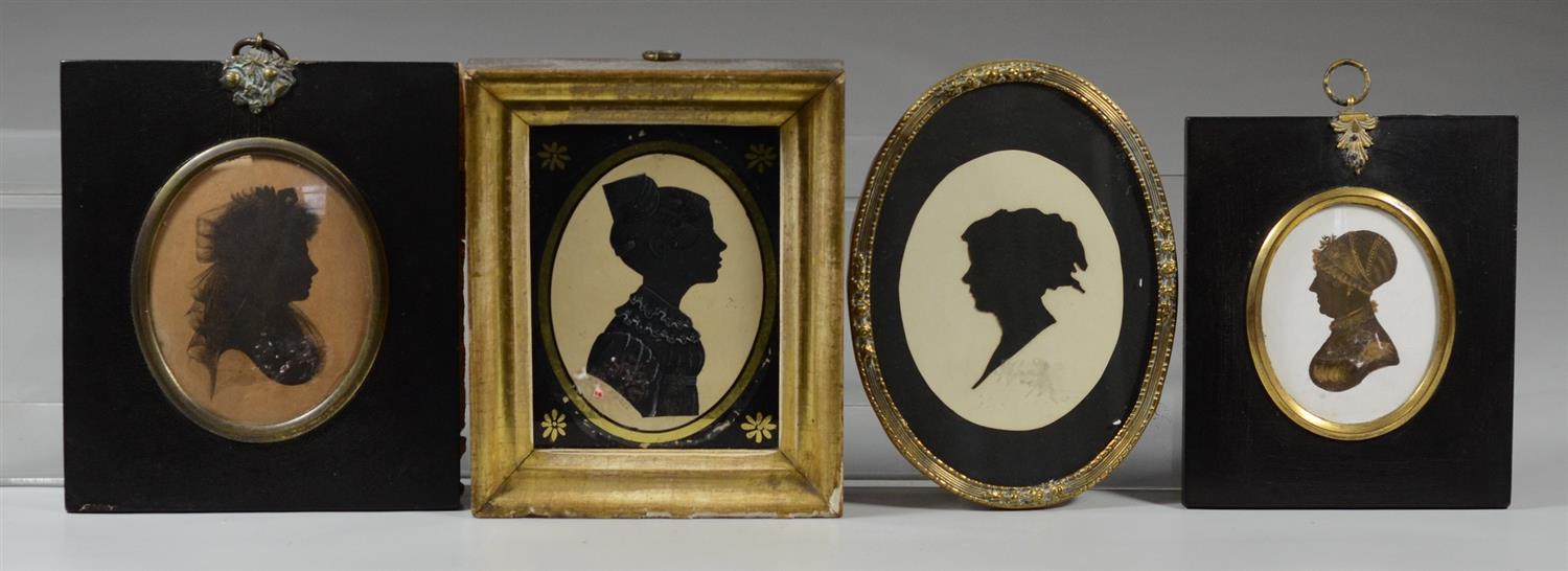 Appraisal: bust portrait silhouettes of women one hand painted with hair