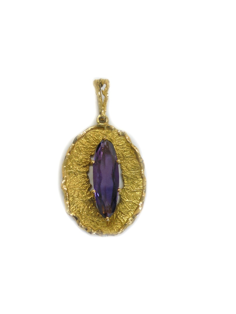 Appraisal: A Continental yellow metal and violet synthetic corundum pendant the