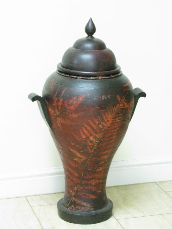 Appraisal: A French terra cotta two handled baluster Vase and Cover