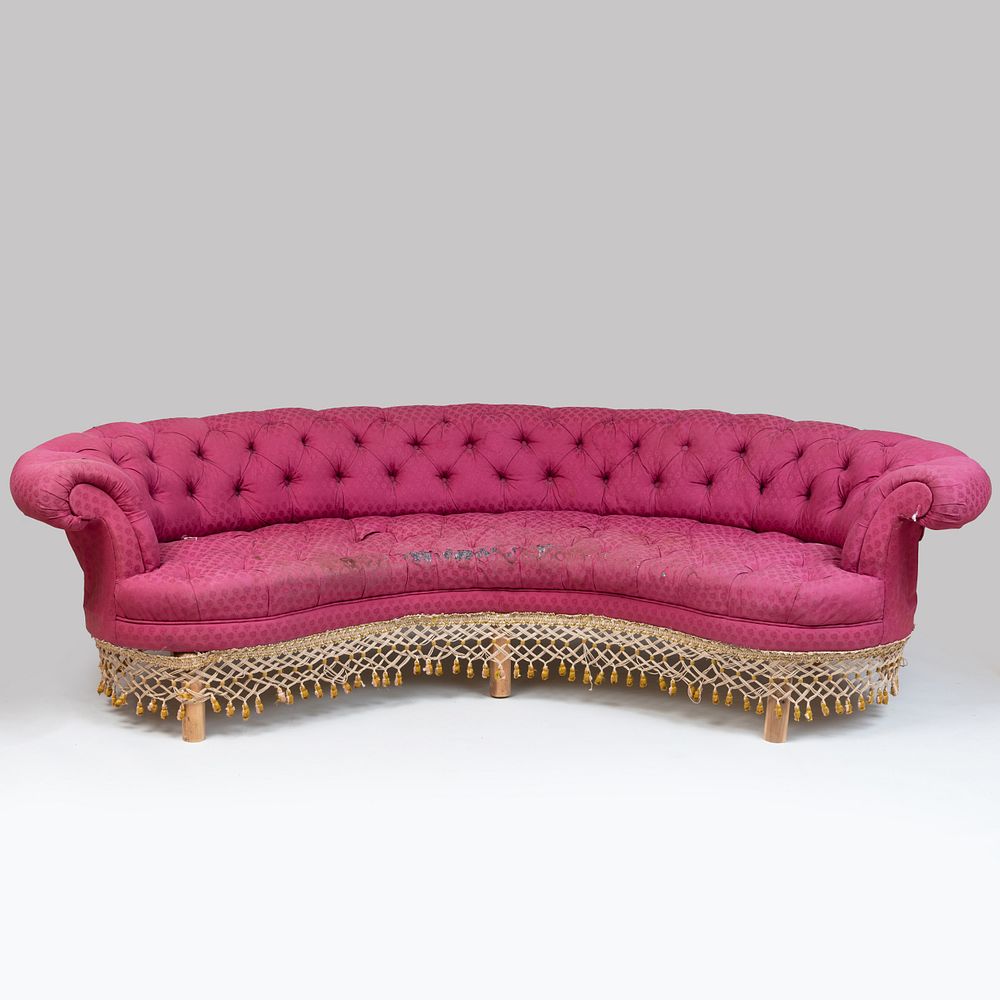 Appraisal: Napolean III Style Tufted Upholstered Kidney-Shaped Sofa Fitted with fringe