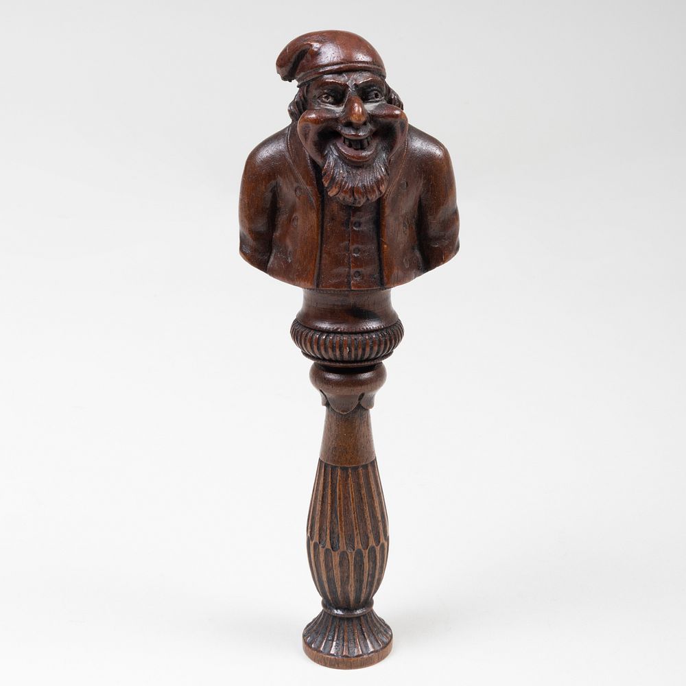 Appraisal: English Carved and Stained Wood Nutcracker of a Satirical Figure