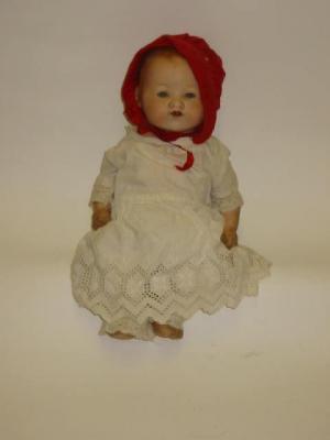 Appraisal: An Armand Marseille bisque head baby doll with blue glass