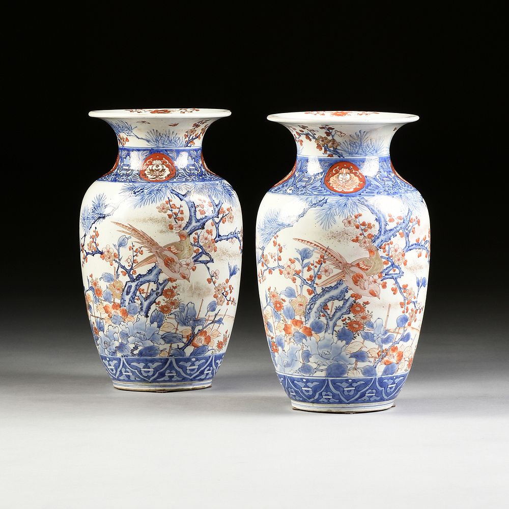 Appraisal: A PAIR OF JAPANESE BLOSSOMING PRUNUS ENAMELED PORCELAIN VASES TH