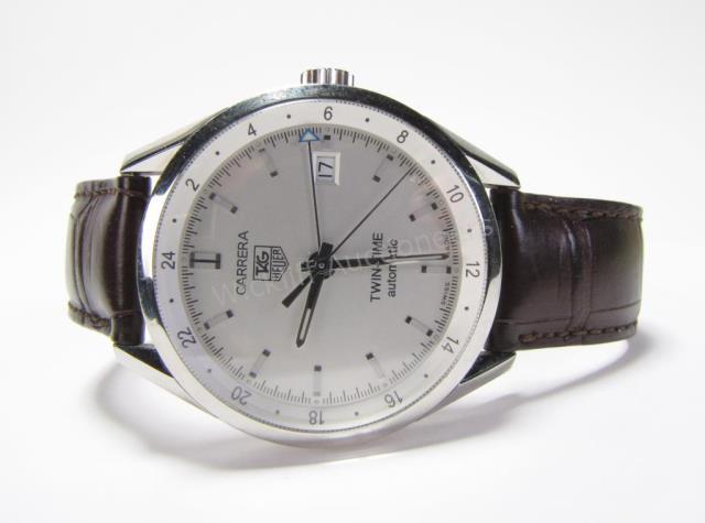 Appraisal: A gentleman's Tag Heuer Twin-Time wristwatch elegant anthracite dial silver