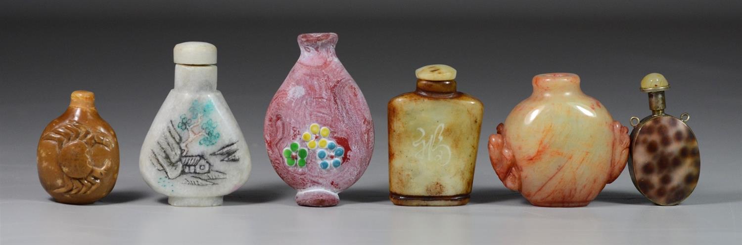 Appraisal: Hardstone Chinese snuff bottles carved painted decoration with a shell