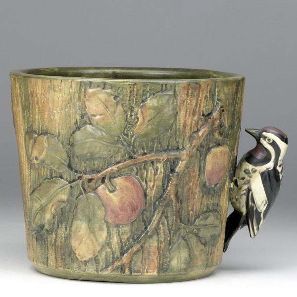 Appraisal: WELLER Woodcraft jardiniere with woodpecker on an apple branch Two